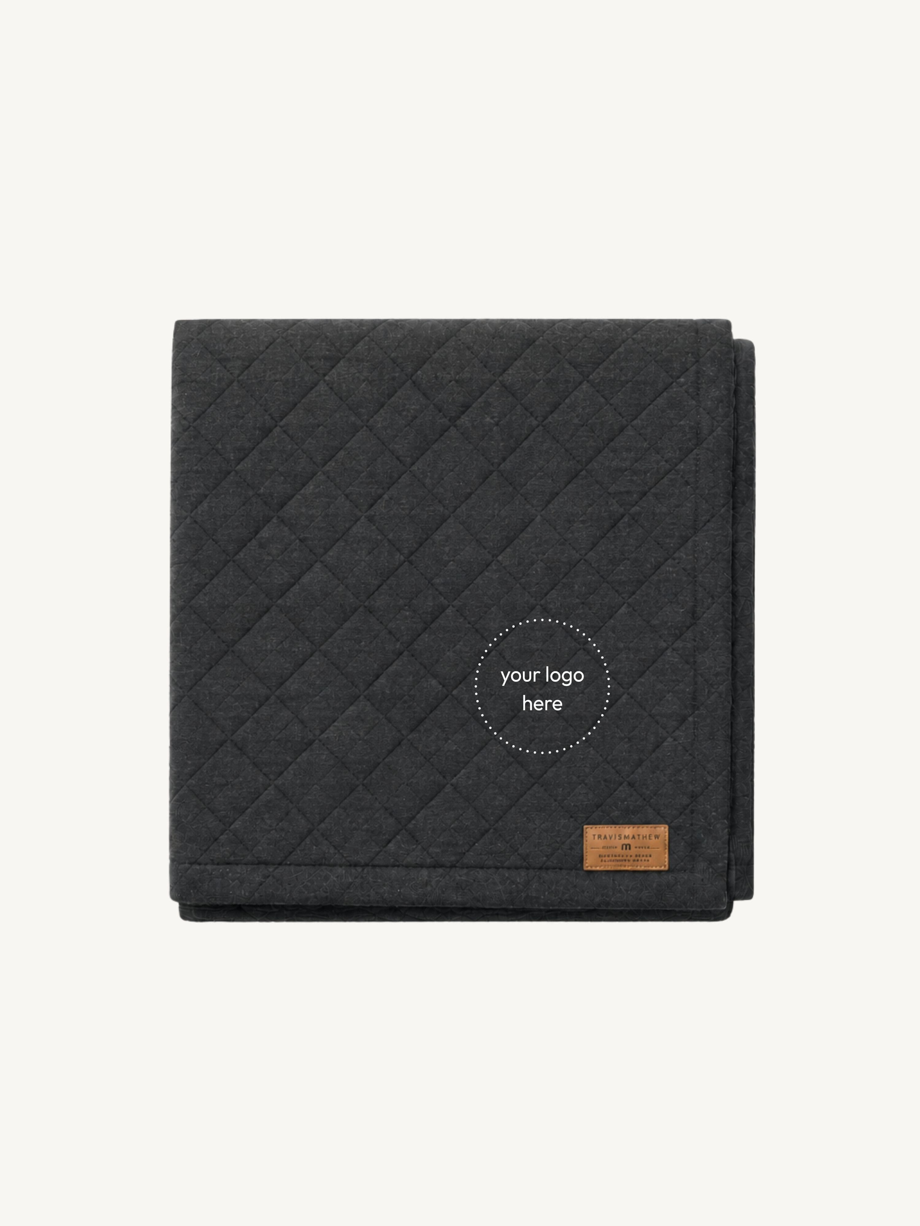 TravisMathew Diamond Quilt Blanket with a custom logo